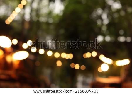 Similar – Image, Stock Photo Outdoor fairy lights in front of light blue sky with small decorative clouds