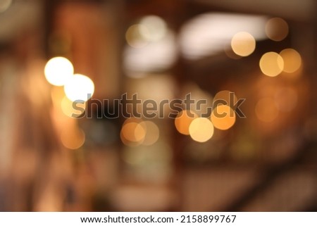 A blurry background image of the lights at night.