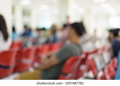 Blurry Background Of Patients Sitting On Chair For Waiting Receive Medicine At Pharmacy Department In Hospital.