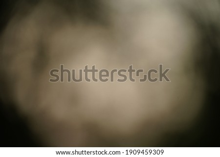 blurry bokeh smoke fog brown background 