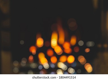 Blurry Burning Gas Fireplace For Winter And Christmas Background.