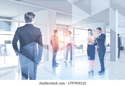 Blurry Business People Working Together In Modern Office. Concept Of Teamwork. Toned Image Double Exposure