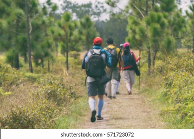 Blurry of Camping Friendship Walking Backpacker and Camp Forest Adventure Travel Remote Relax Concept  - Shutterstock ID 571723072