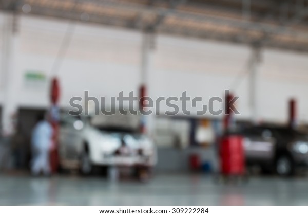 blurry cars  service
station for background