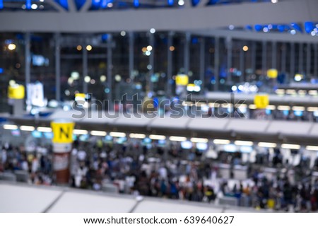 blurry check-in counter in modern airport