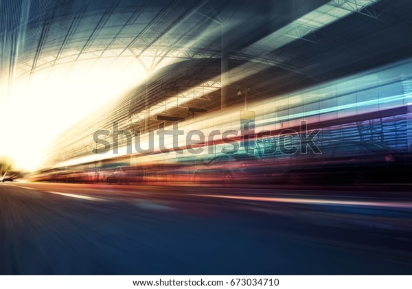 Blurry chromatic color tunnel car\
traffic motion blur. Motion blur  the speed and\
dynamics.