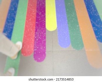 Blurry defocused multicoloured background with space for runaround or wraparound text 