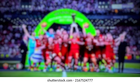 Blurry And Defocused, Professional Football Team Celebration For Champion Trophy With Blur Effect. Blur Background Concept.