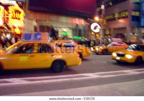 Blurry drunken view of\
busy city street