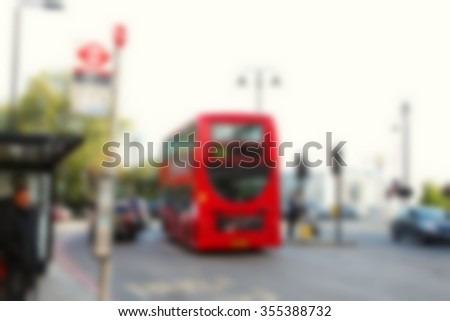 The blurry focus scene of bus moving on road represent the vehicle and transportation concept related idea.