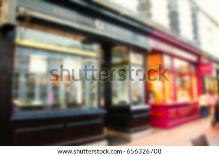 Blurry focus of the shop in the city scene.