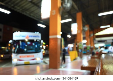 Blurry Image Of Bus Station At Night