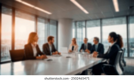 Blurry image of a business meeting in a modern office setting with large windows and natural light. Suitable for corporate and business themes - Powered by Shutterstock