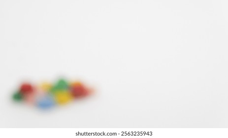 blurry image of a colored object on a white background