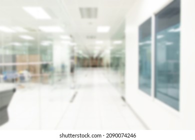 Blurry Image Of Footpath Office Building Lobby With Glass Walls And Doors. Modern Interior. Abstract Defocused Blurred Background.