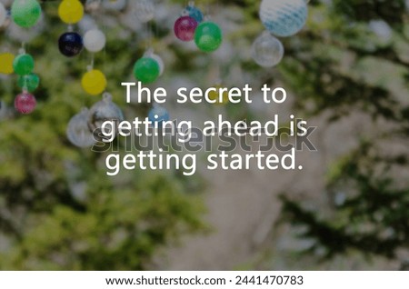 Blurry image with Inspirational quotes the secret of getting ahead is getting started