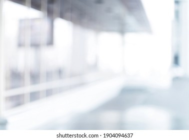 Blurry Image Of An Office With Glass Walls.