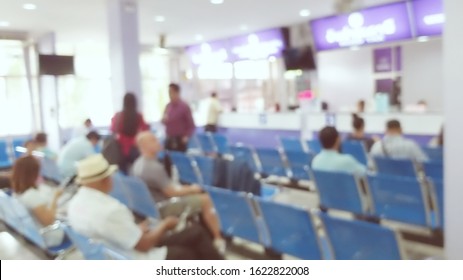 Blurry Image Of People Sitting In A Waiting Queue To Get Service From Government Agency In Thailand