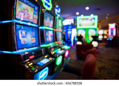 Blurry image of slots machines at the Casino - Shutterstock ID 456788338