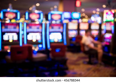 Blurry image of slots machines at the Casino - Shutterstock ID 456788344