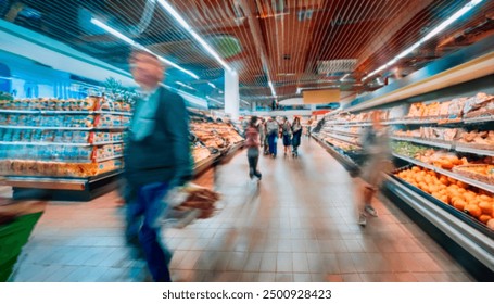 Blurry image of a supermarket aisle with shoppers moving quickly, creating a dynamic and busy atmosphere, ideal for retail or consumerism themes. - Powered by Shutterstock