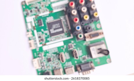 blurry image of a television's electronic circuit board, abstract background