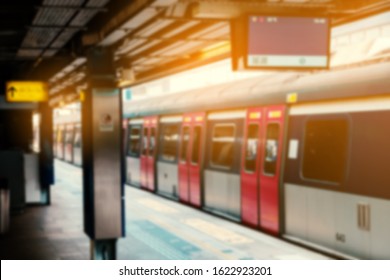 Blurry Image Of Train On Railway Platform At  MTR Station / Subway Train Station In HongKong