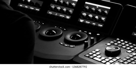 Blurry Images Of Telecine Controller Machine Transferring Motion Picture Film Into Video And Editing Or Adjusting In A Color Suite Studio Lab. Which Used In The Movie Post-production Process 