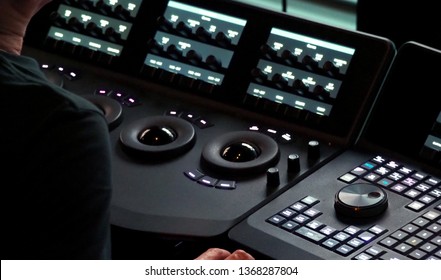 Blurry Images Of Telecine Controller Machine Transferring Motion Picture Film Into Video And Editing Or Adjusting In A Color Suite Studio Lab. Which Used In The Movie Post-production Process 