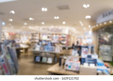 Blurry  Library Background And Co-working Space. Library Resources Book Shelves