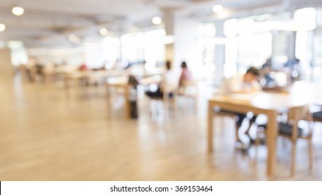 Blurry Light Background In Library Room With People