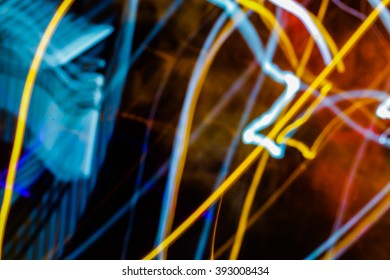 Blurry light effect from small size of multicolor lightbulb on dark background represent the abstract concept related idea.