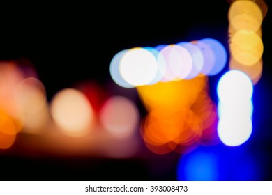 Blurry light effect from small size of multicolor lightbulb on dark background represent the abstract concept related idea.