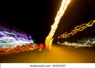 Blurry light effect from small size of multicolor lightbulb on dark background represent the abstract concept related idea.