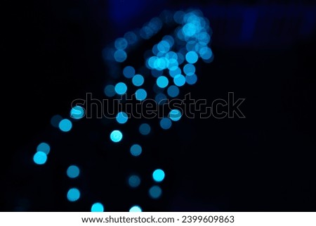 Blurry lights in blue. Bokeh background