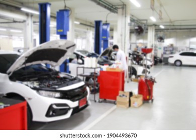 Blurry Line Of Body Car With The Equipment Repair Station In The Garage Shop. Fix Maintenance Or Checking By Mechanic Workshop. Business About Of Car Or Vehicle Concept.