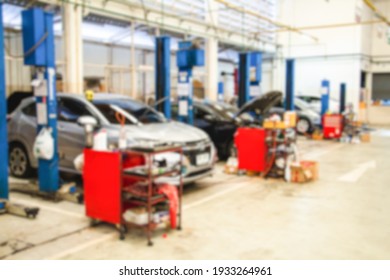Blurry Line of body Car with the equipment repair station in the garage shop. fix maintenance or checking by mechanic workshop. Business about of car or vehicle concept.