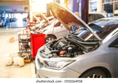 Blurry Line of full body Car with the equipment repair station in the garage shop. fix maintenance or checking by mechanic workshop. Business about of car concept.