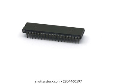 A blurry microcontroller on a white background. An archaic concept of technological advancement.
