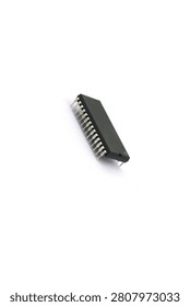 A blurry microcontroller on a white background. An archaic concept of technological advancement.