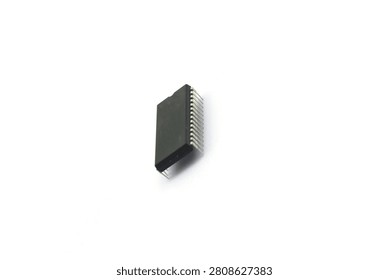 A blurry microcontroller on a white background. An archaic concept of technological advancement.