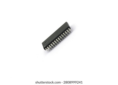 A blurry microcontroller on a white background. An archaic concept of technological advancement.