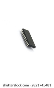 A blurry microcontroller on a white background. An archaic concept of technological advancement.