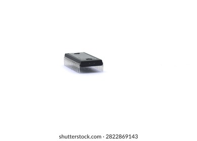 A blurry microcontroller on a white background. An archaic concept of technological advancement.