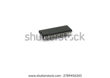 A blurry microcontroller on a white background. An archaic concept of technological advancement.