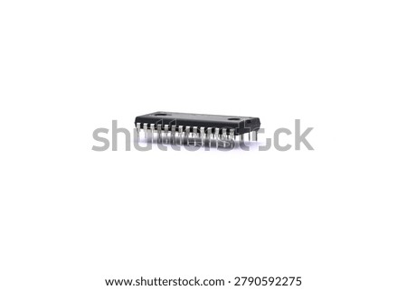 A blurry microcontroller on a white background. An archaic concept of technological advancement.