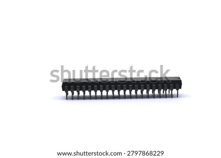 A blurry microcontroller on a white background. An archaic concept of technological advancement.