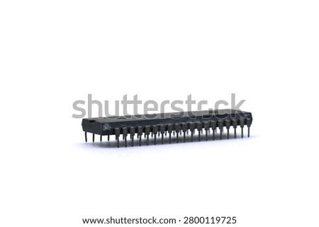 A blurry microcontroller on a white background. An archaic concept of technological advancement.