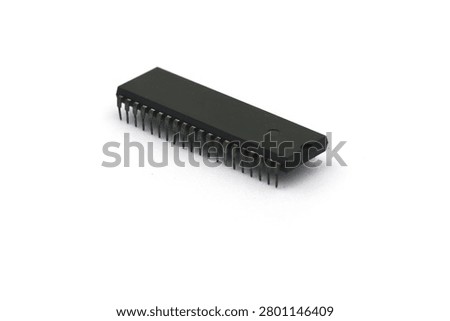 A blurry microcontroller on a white background. An archaic concept of technological advancement.