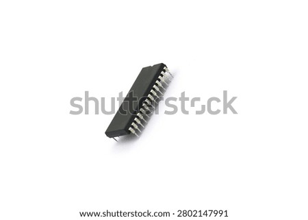 A blurry microcontroller on a white background. An archaic concept of technological advancement.
